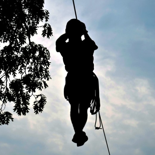 a man flying through the sky