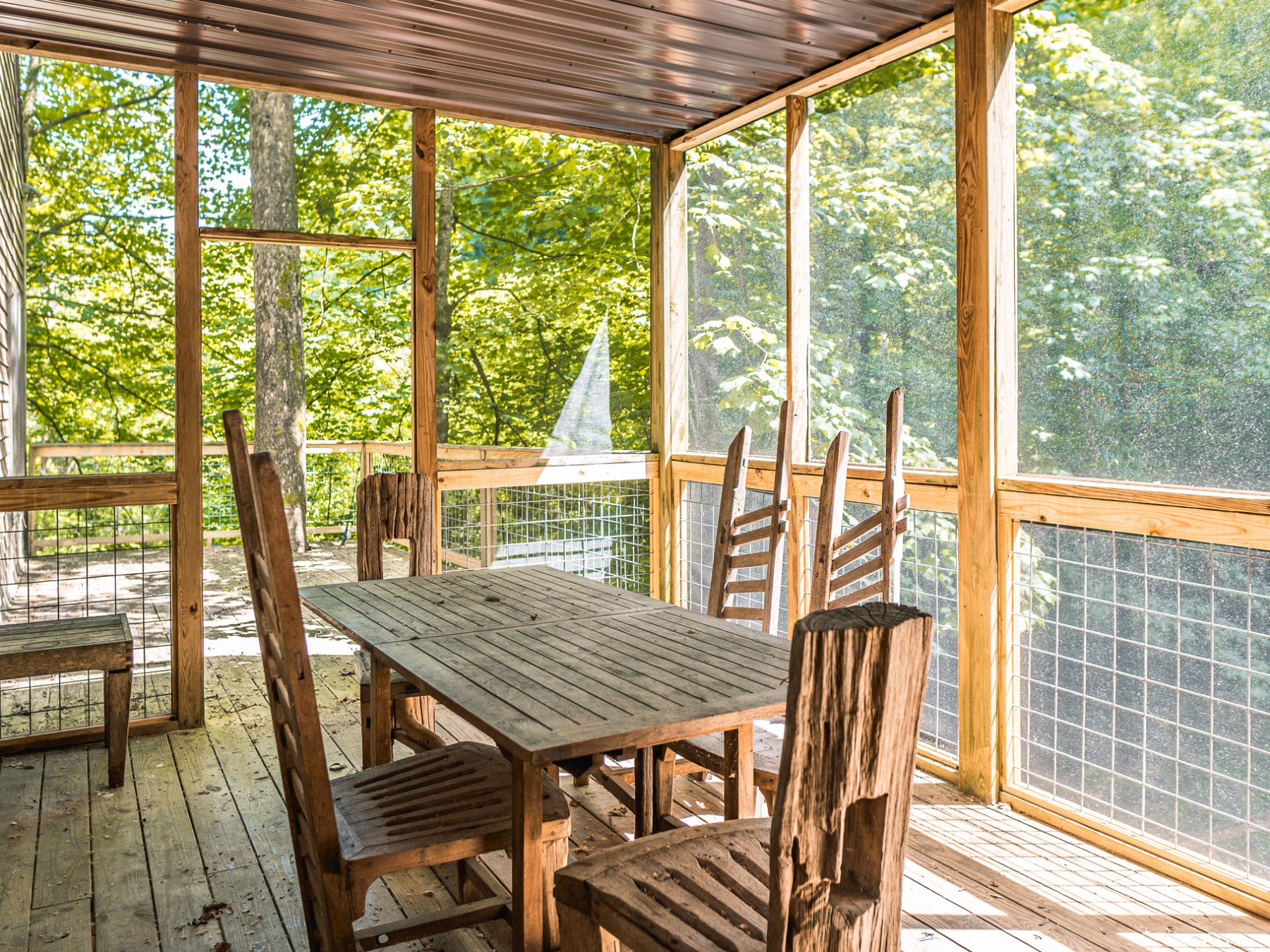 a room filled with furniture and a large window