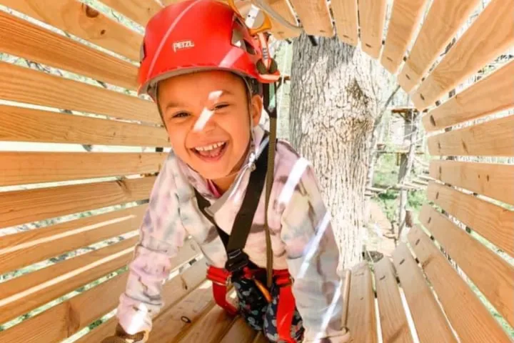 a little boy wearing a hat