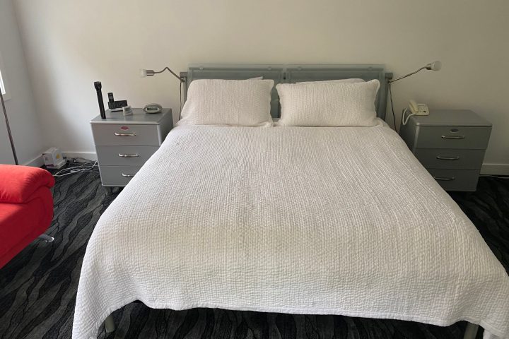 a made bed in a bedroom