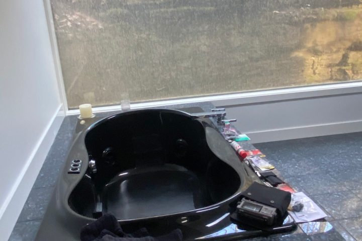 a person sitting on a motorcycle