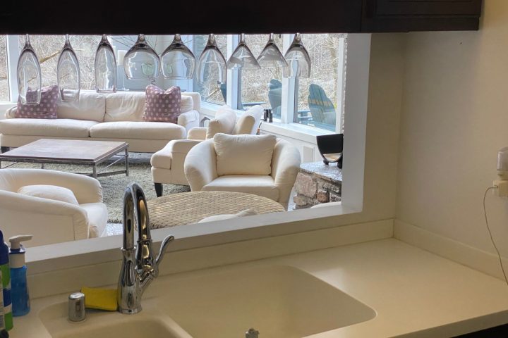 a room with a sink and a mirror