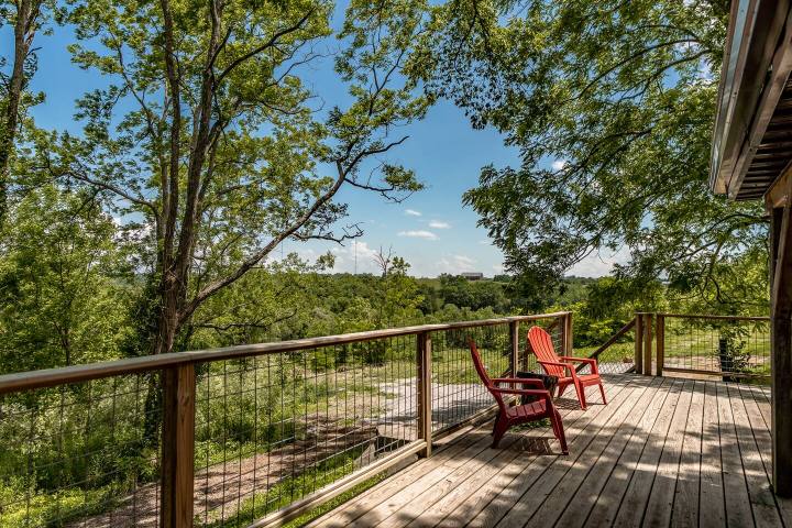 a bridge going over a wooden fence